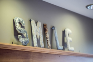 Sign Reading "SMILE"